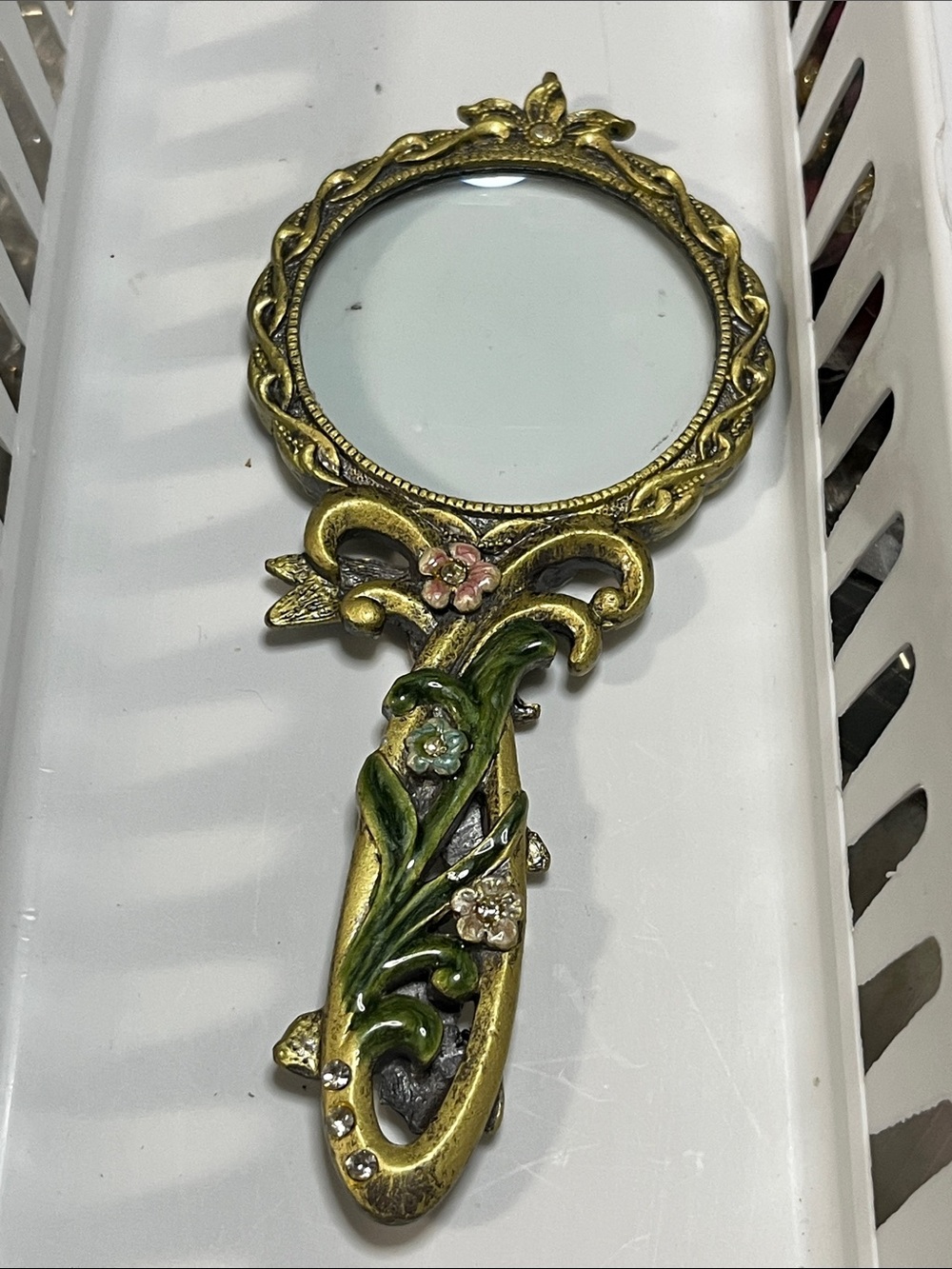 Vintage Gold Handheld Mirror with Green Leaves and Pink Accents